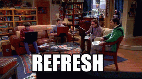 A GIF of four men on computers on chairs pressing buttons on their keyboards with the text "refresh" on the bottom part of the image.